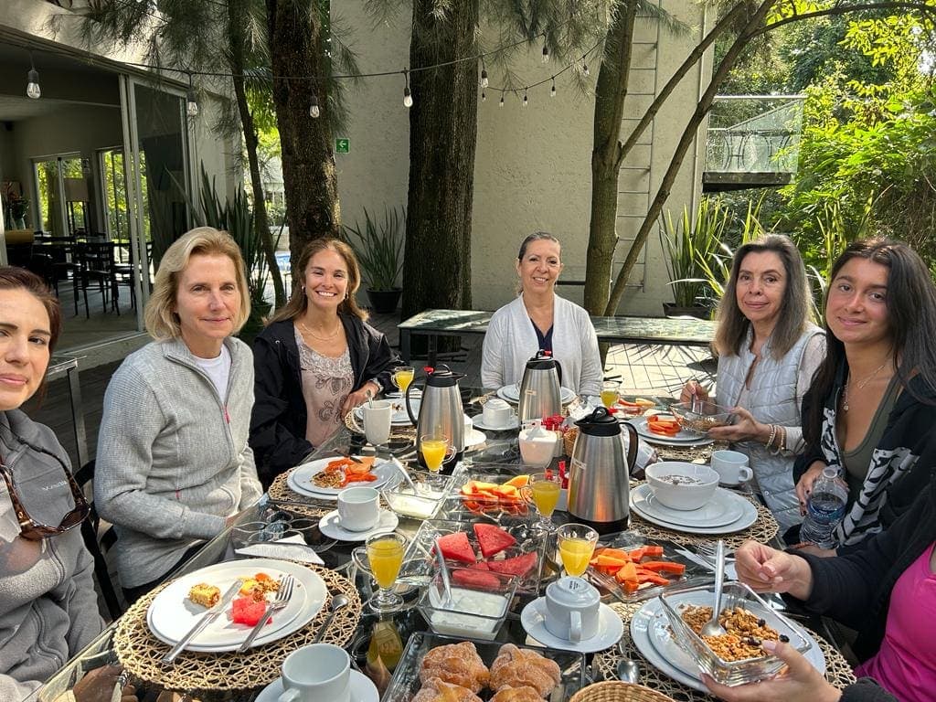 Guests sharing breakfast on the terrace