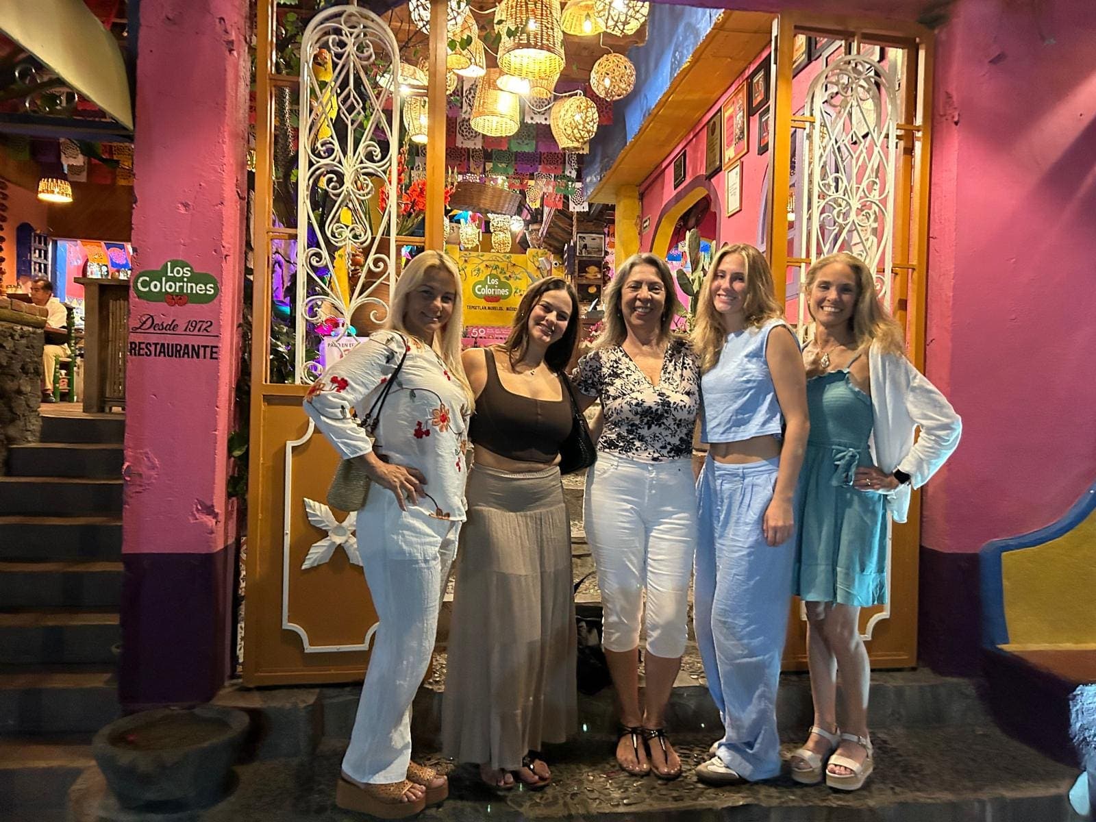 A brightly painted storefront in Tepoztlán at night